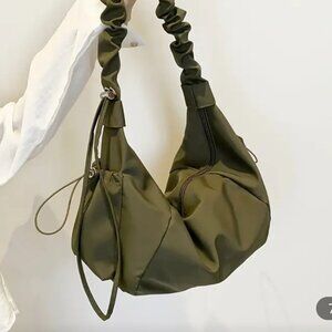 ARMY GREEN NYLON HAND BAG.
